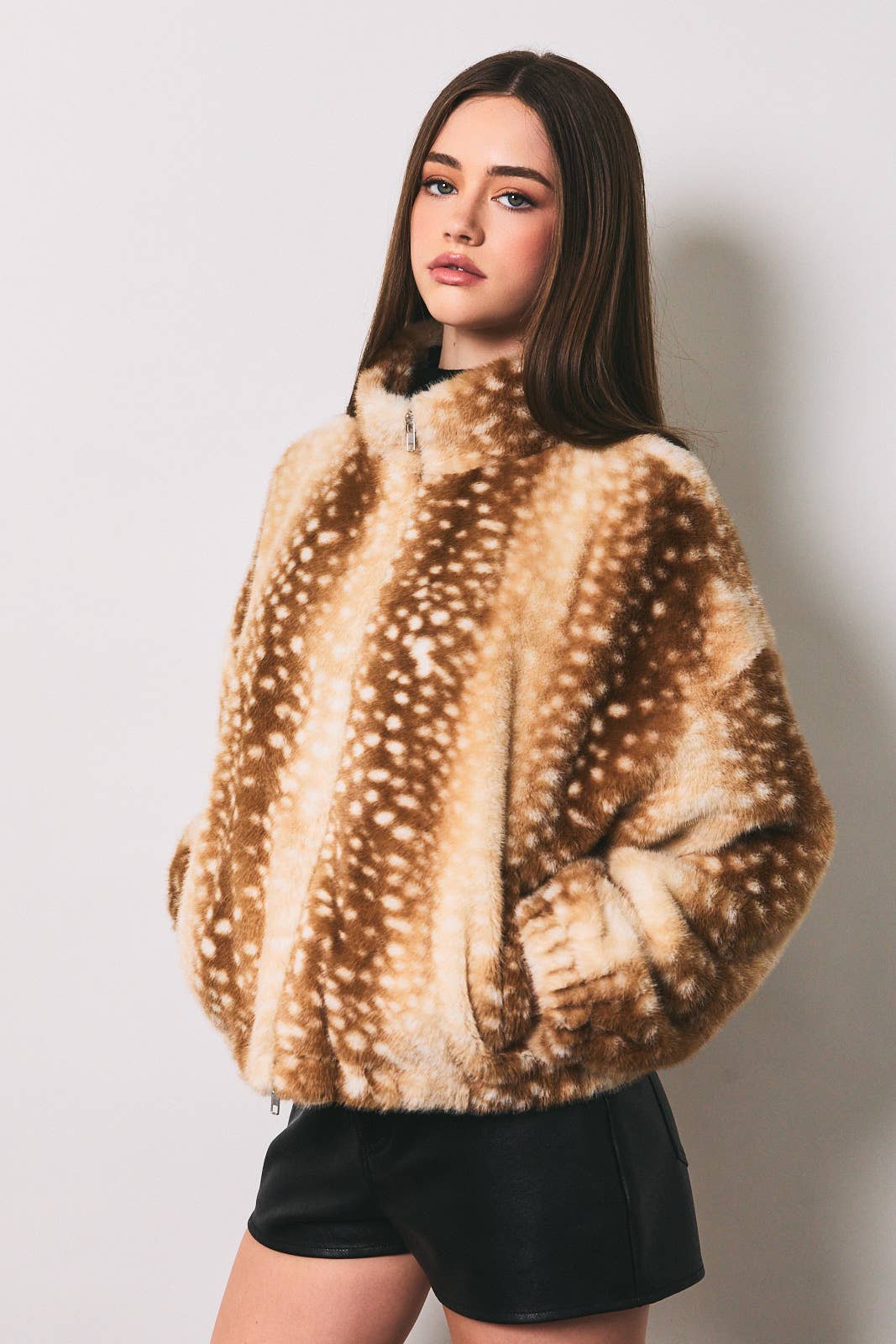 LE LIS faux deer print high neck zip jacket featuring a stylish print and high collar, displayed on a hanger.