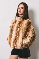 LE LIS faux deer print high neck zip jacket featuring a stylish print and high collar, displayed on a hanger.