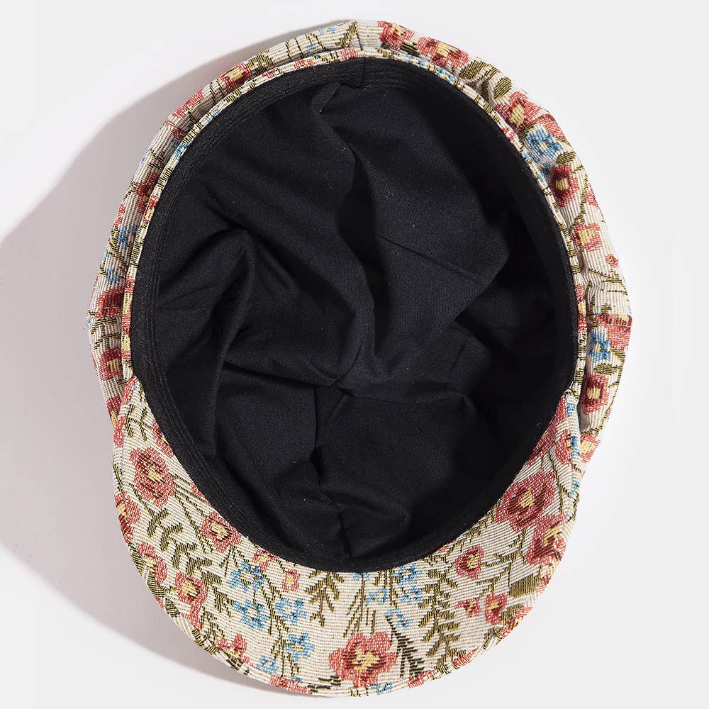 Floral tapestry newsboy cabbie hat by Collections by Fame Accessories, featuring colorful floral fabric and classic newsboy style.