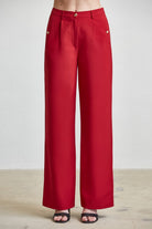 High waist tailored wide-leg trousers with button details by RARA Boutique, featuring a stylish fit and classic design.