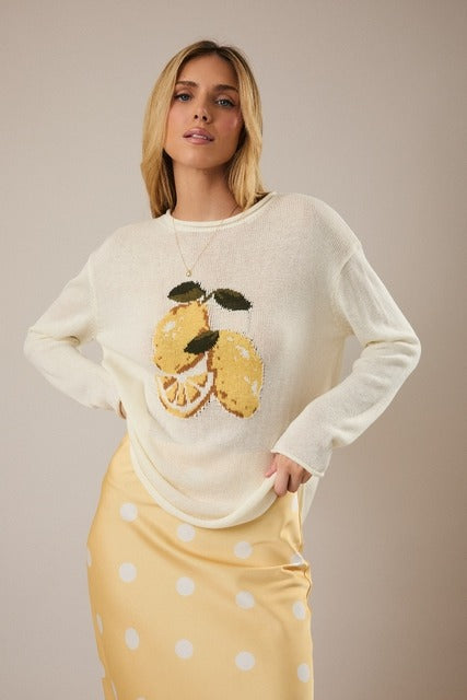 RARA Boutique lemon graphic lightweight knit sweater with long sleeves and ribbed cuffs, casual and cozy for spring.