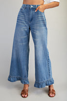 Ruffle hem wide-leg mineral washed jeans by RARA Boutique, featuring relaxed fit and stylish ruffle details on the hem.