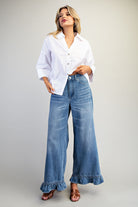 RARA Boutique mineral washed wide-leg jeans with ruffle hem, featuring a relaxed fit and stylish distressed details.