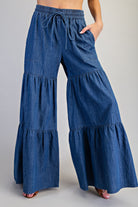 RARA Boutique mineral washed denim palazzo pants with a tiered ultra-wide leg design, stylish and comfortable for casual wear