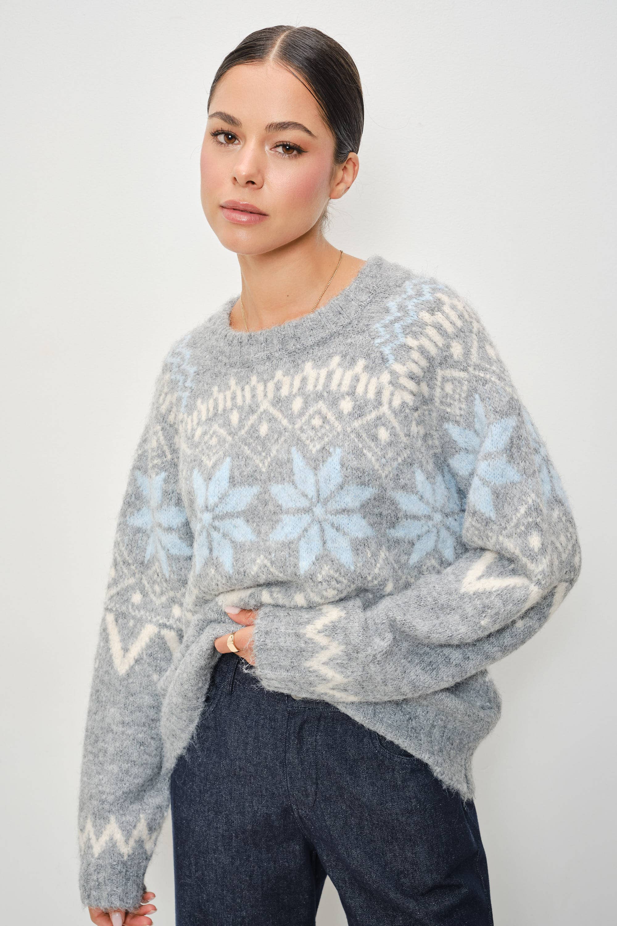 Pretty Garbage RIA Faire Isle crewneck knitted pullover in cozy, patterned fabric, displayed on a neutral background.