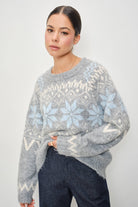 Pretty Garbage RIA Faire Isle crewneck knitted pullover in cozy, patterned fabric, displayed on a neutral background.