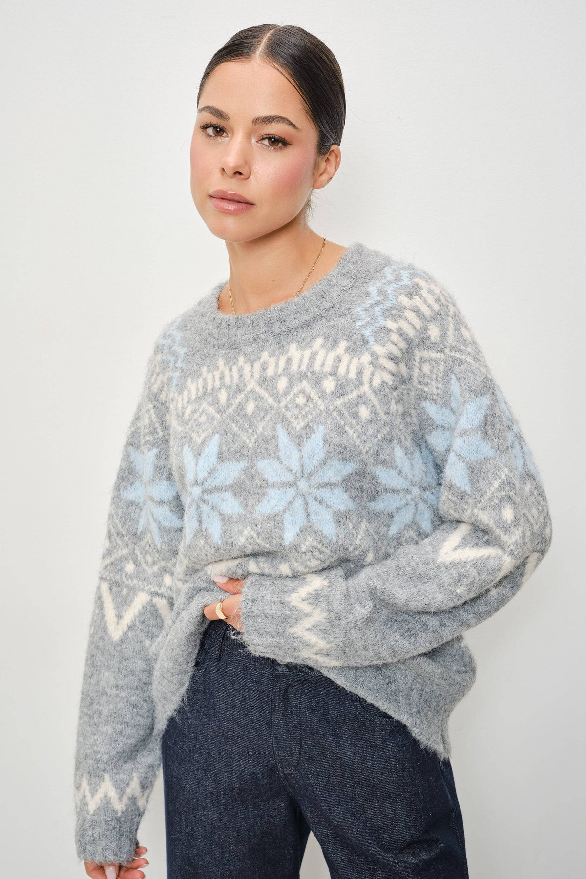 Pretty Garbage RIA Faire Isle crewneck knitted pullover in cozy, patterned fabric, displayed on a neutral background.