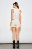 Embroidered seashell ribbed tank top from RARA Boutique featuring a fitted sleeveless design and seashell embroidery detail.