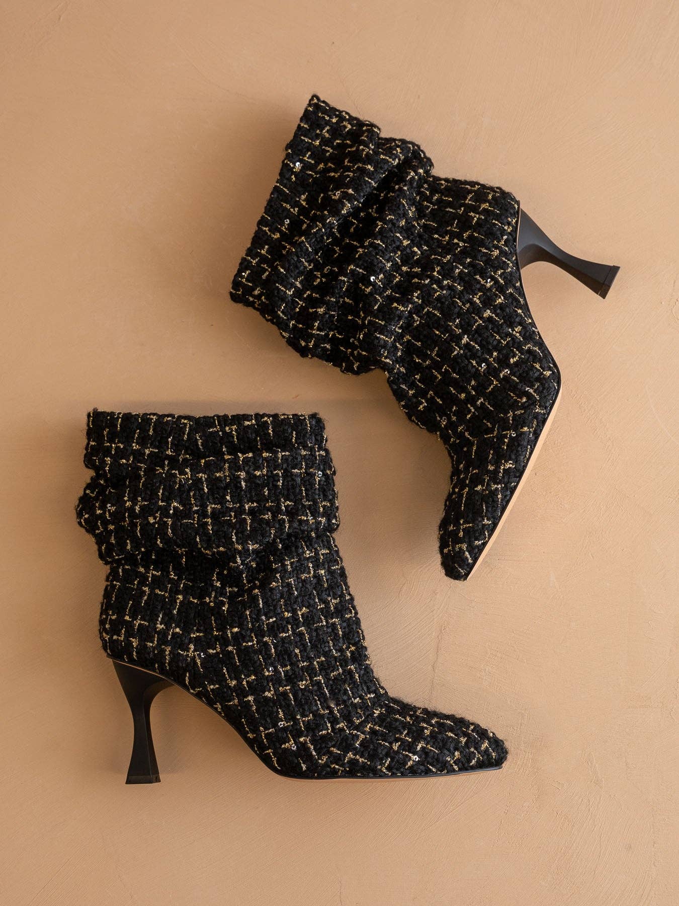 Black tweed slouch heel fall bootie from Oasis Society featuring a stylish design and comfortable ankle height.