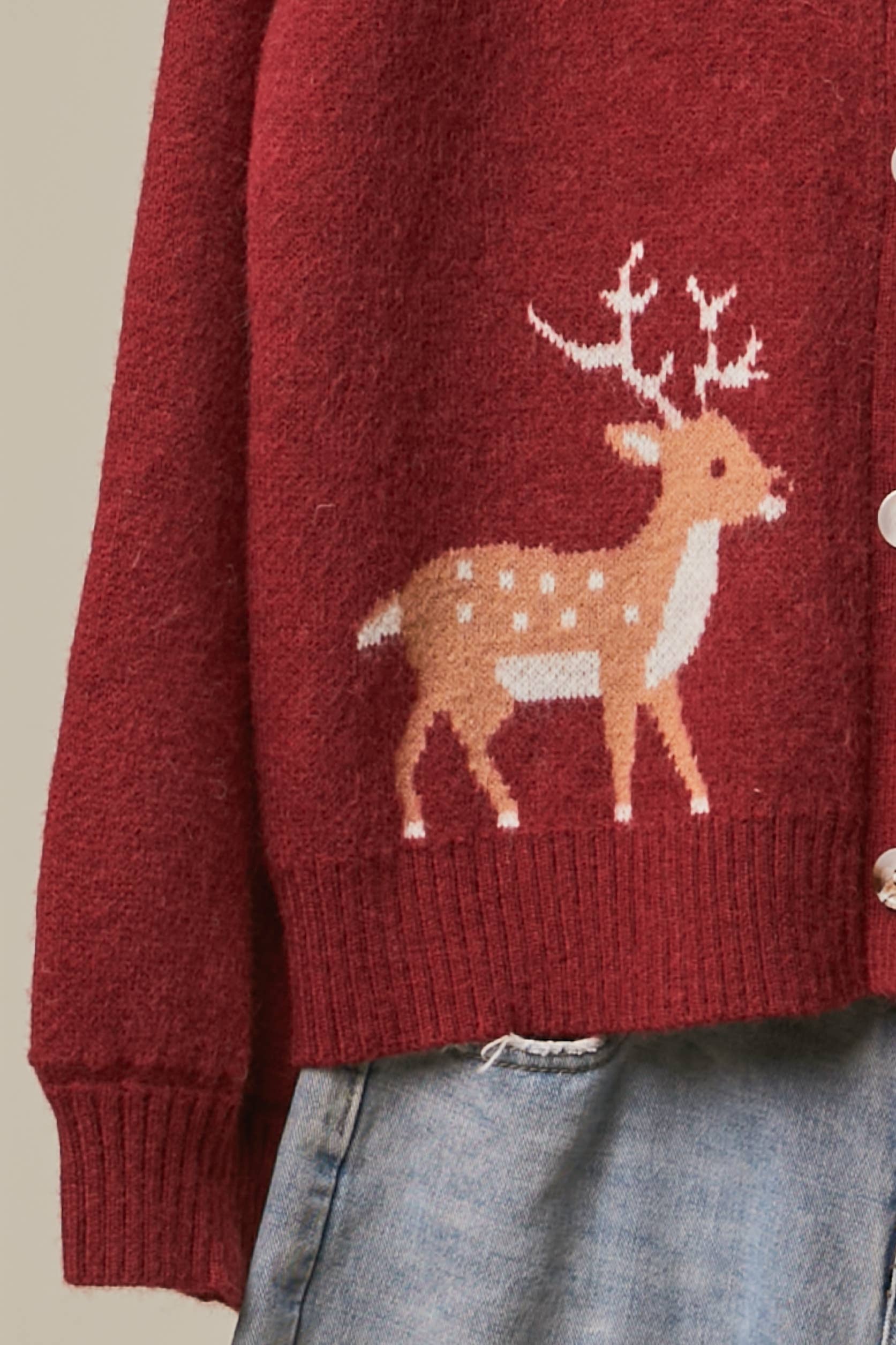 Mello Reindeer Fair Isle knit cardigan featuring festive holiday patterns in cozy wool blend with button closure.