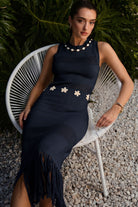 Navy cowrie shell open-knit fringe maxi dress by RARA Boutique featuring flowy fabric and intricate shell details.