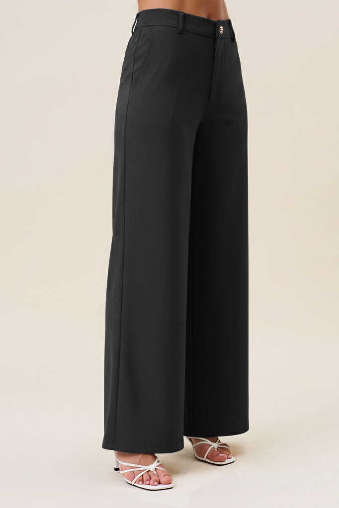Black high waist tailored wide-leg trousers by RARA Boutique, featuring a sleek, structured design and classic fit.