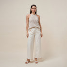 Seashell embellished open-knit halter tank top by RARA Boutique, featuring a stylish design with seashell details.