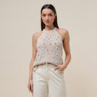 Seashell embellished open-knit halter tank top by RARA Boutique featuring a stylish, lightweight design with a relaxed fit.