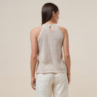 Seashell embellished open-knit halter tank top by RARA Boutique featuring a stylish, lightweight design with natural seashell accents.