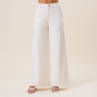 High waist tailored wide leg trousers by RARA Boutique, featuring a classic fit and clean design for a stylish professional look.