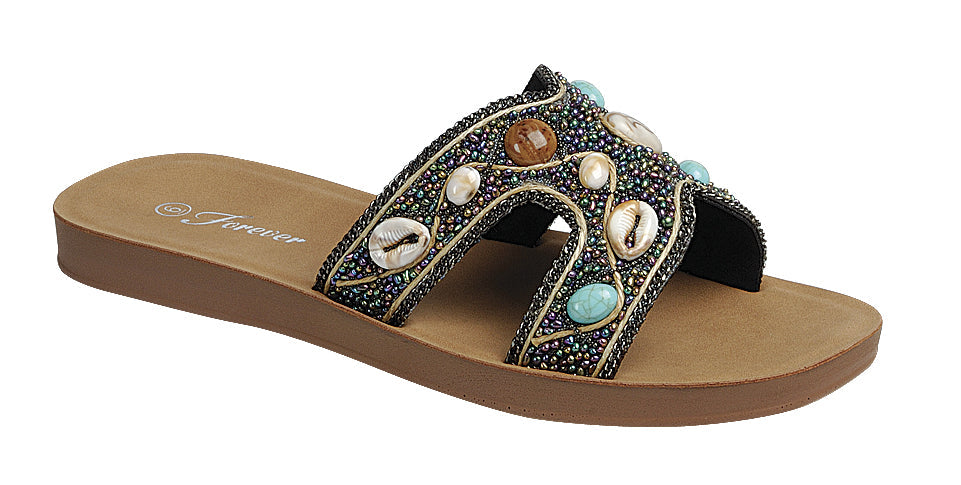 Black boho H-strap slide sandals with seashell and beaded details by RARA Boutique, featuring a stylish, casual design.