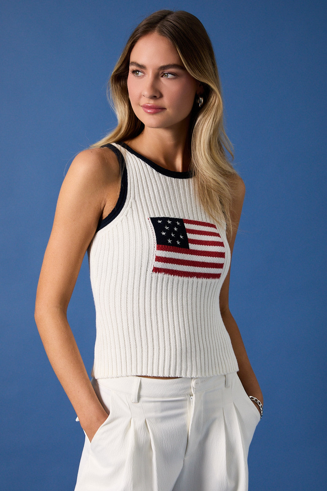 White and navy American flag sleeveless knit tank top by RARA Boutique, featuring patriotic star and stripe design.