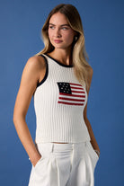 White and navy American flag sleeveless knit tank top by RARA Boutique, featuring patriotic star and stripe design.