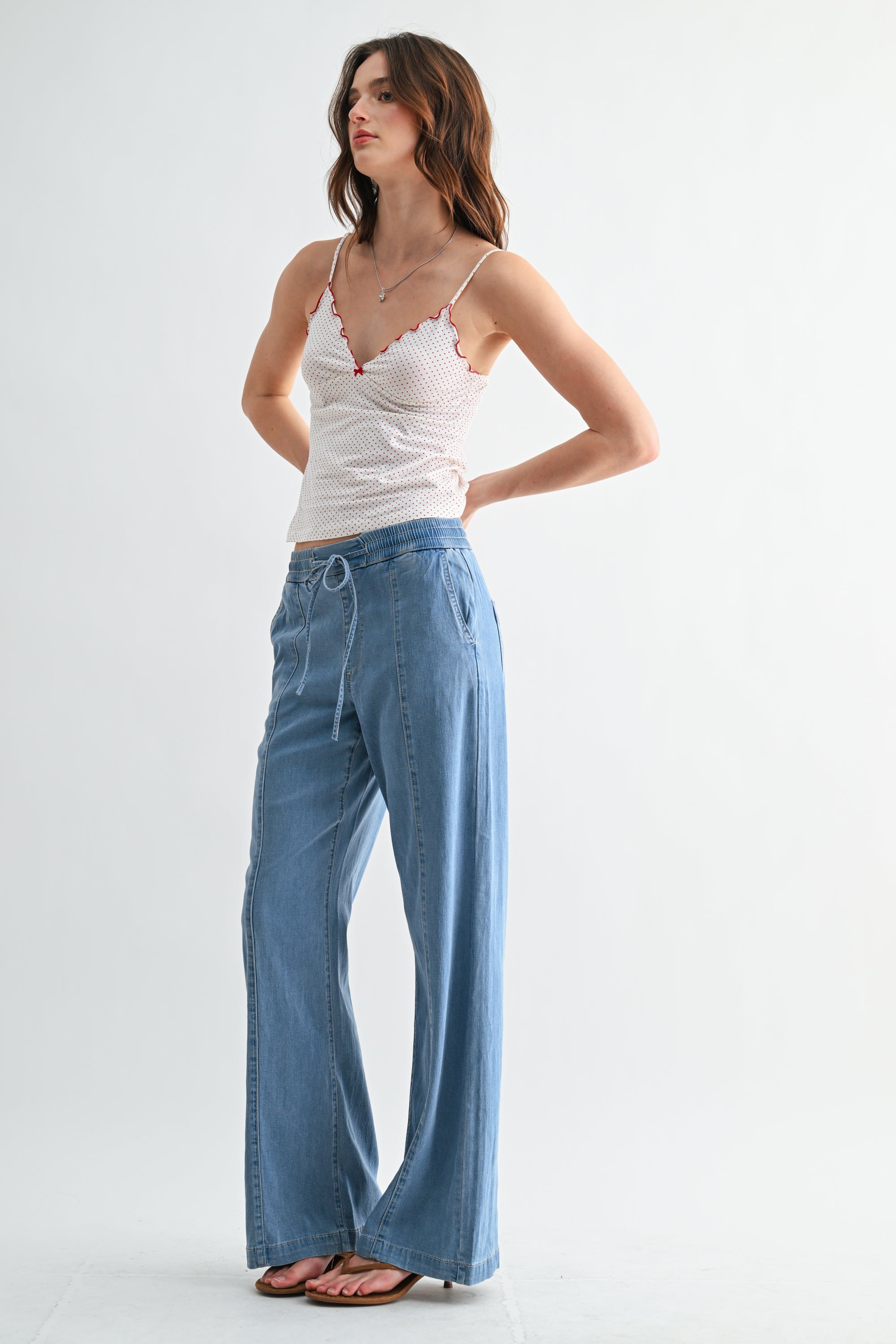 Lightweight denim jogger pants with elastic waist from RARA Boutique, shown in a relaxed fit with cuffed ankles.