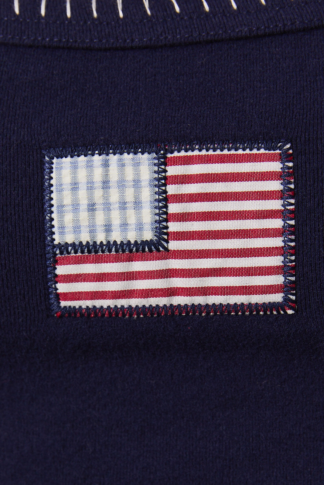 Navy American flag patchwork cropped tank top with contrast trim from RARA Boutique, featuring a stylish sleeveless design.
