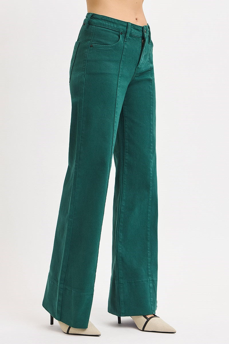 Risen Tummy Control Mid Rise Pin Tuck Wide Leg Jeans in hunter green with wide hem and relaxed fit, showcasing their stylish design.