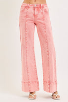 Mineral washed mid-rise wide leg jeans with front seams from RARA Boutique, featuring a relaxed fit and trendy style.