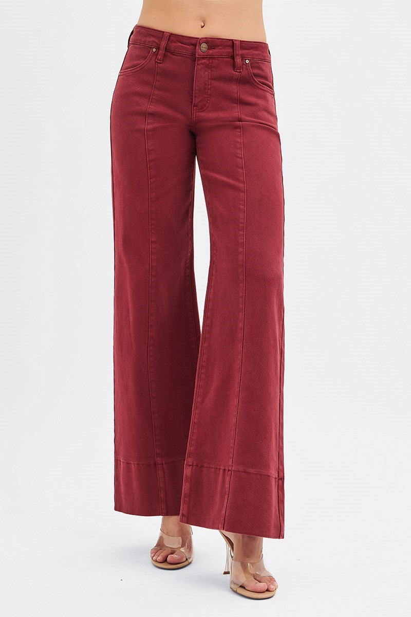 Risen Tummy Control Mid Rise Pin Tuck Wide Leg Jeans with Wide Hem in wine color, showcasing high waist, pin tucks, and wide-leg style.