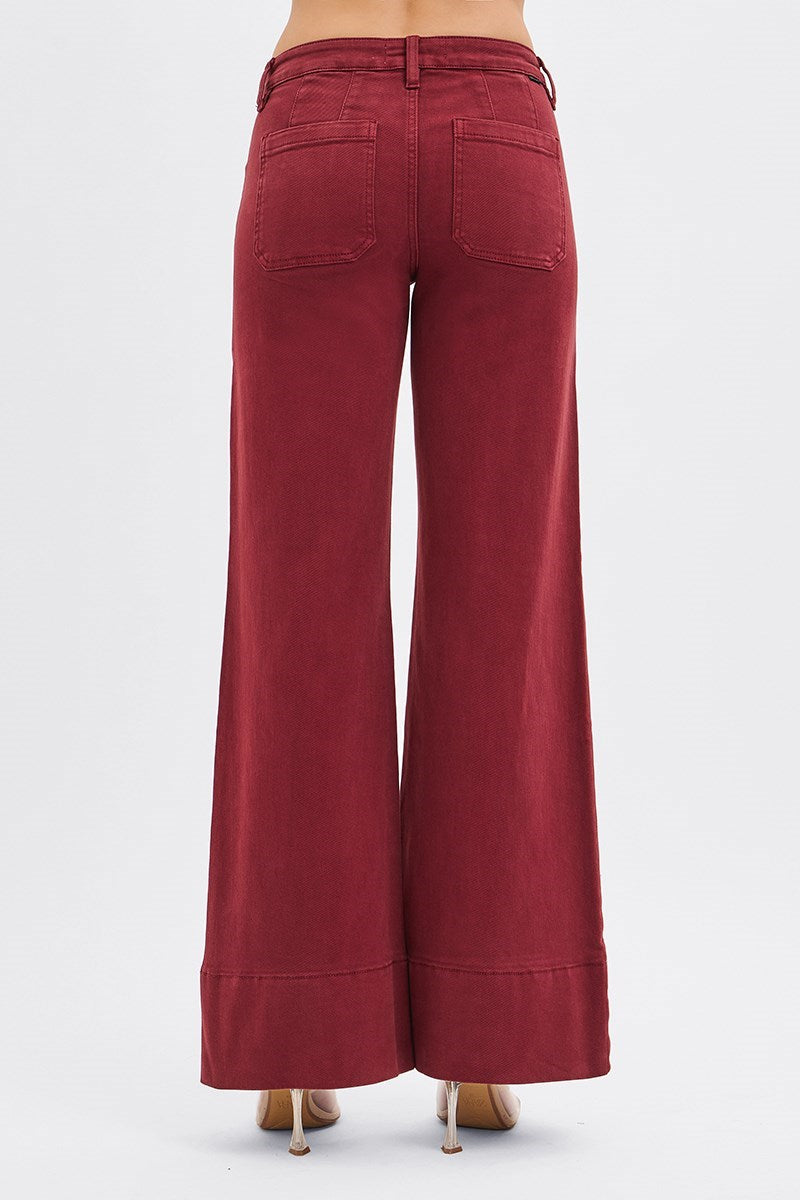 RARA Boutique wine-colored tummy control mid-rise pin tuck wide leg jeans with wide hem, showing front view with belt loops and pockets.