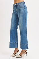 Medium rinse Pintuck Tummy Control Wide Leg Cropped Jeans with wide hem from RARA Boutique, showing the relaxed fit and stylish design.