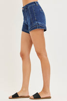 Dark denim layered double hem front seam shorts by Risen, featuring a stylish front seam and distressed double hem detail.