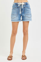 Light blue Grommet Waist Tie Cutoff Denim Shorts by Risen with distressed edges and casual fit, perfect for summer wear.