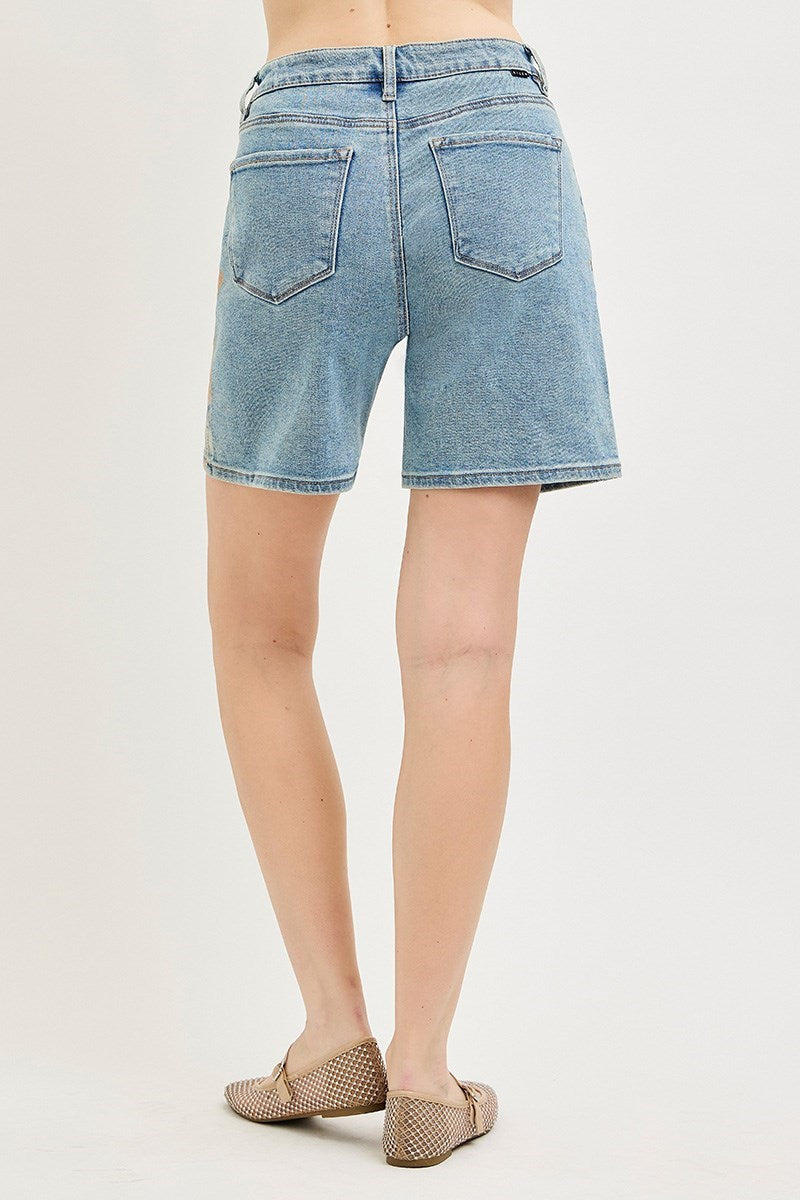 Artsy floral collage print wide-leg Bermuda denim shorts by Risen, featuring a stylish, relaxed fit and vibrant floral design.