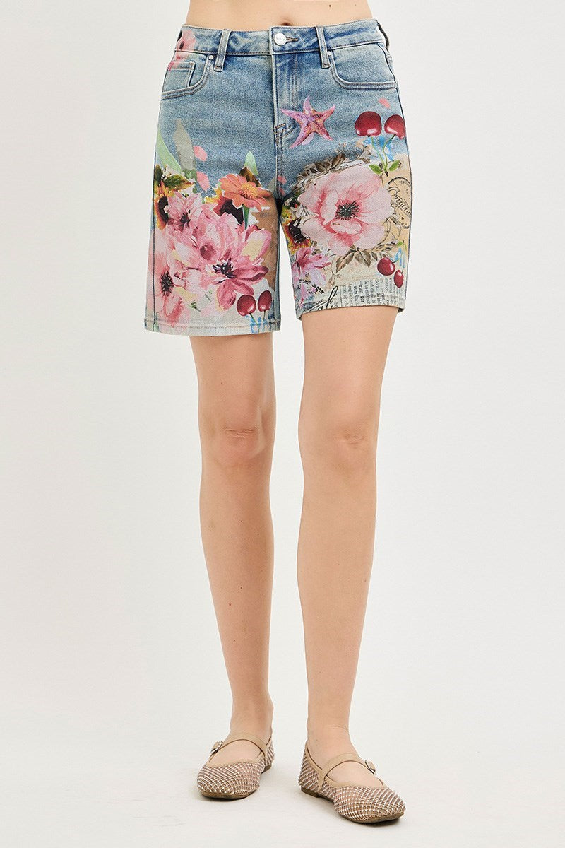 Artsy floral collage print wide-leg Bermuda denim shorts by Risen showcasing a stylish, colorful design with a relaxed fit.