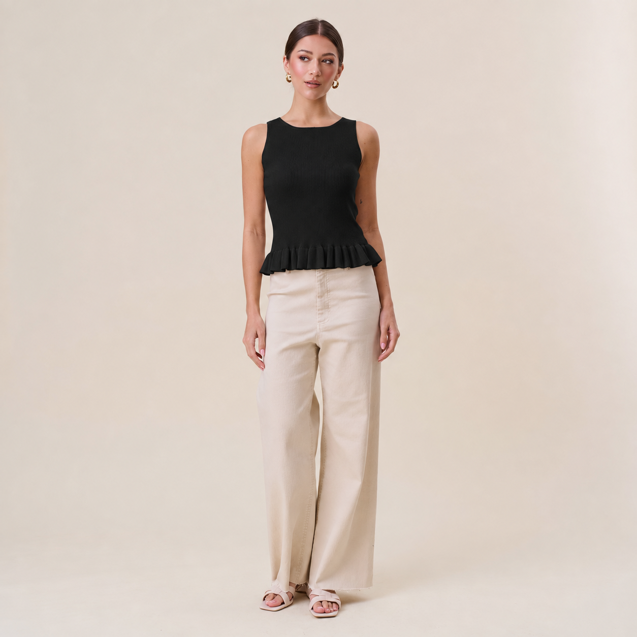 Able Tuesday top AT3189 ruffle rib-knit tank top with ruffled neckline and fitted ribbed fabric, shown in a close-up image.