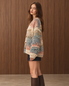 Multicolor textured fringe button-down cardigan sweater by RARA Boutique, featuring rustic fringe details and a cozy, stylish fit.