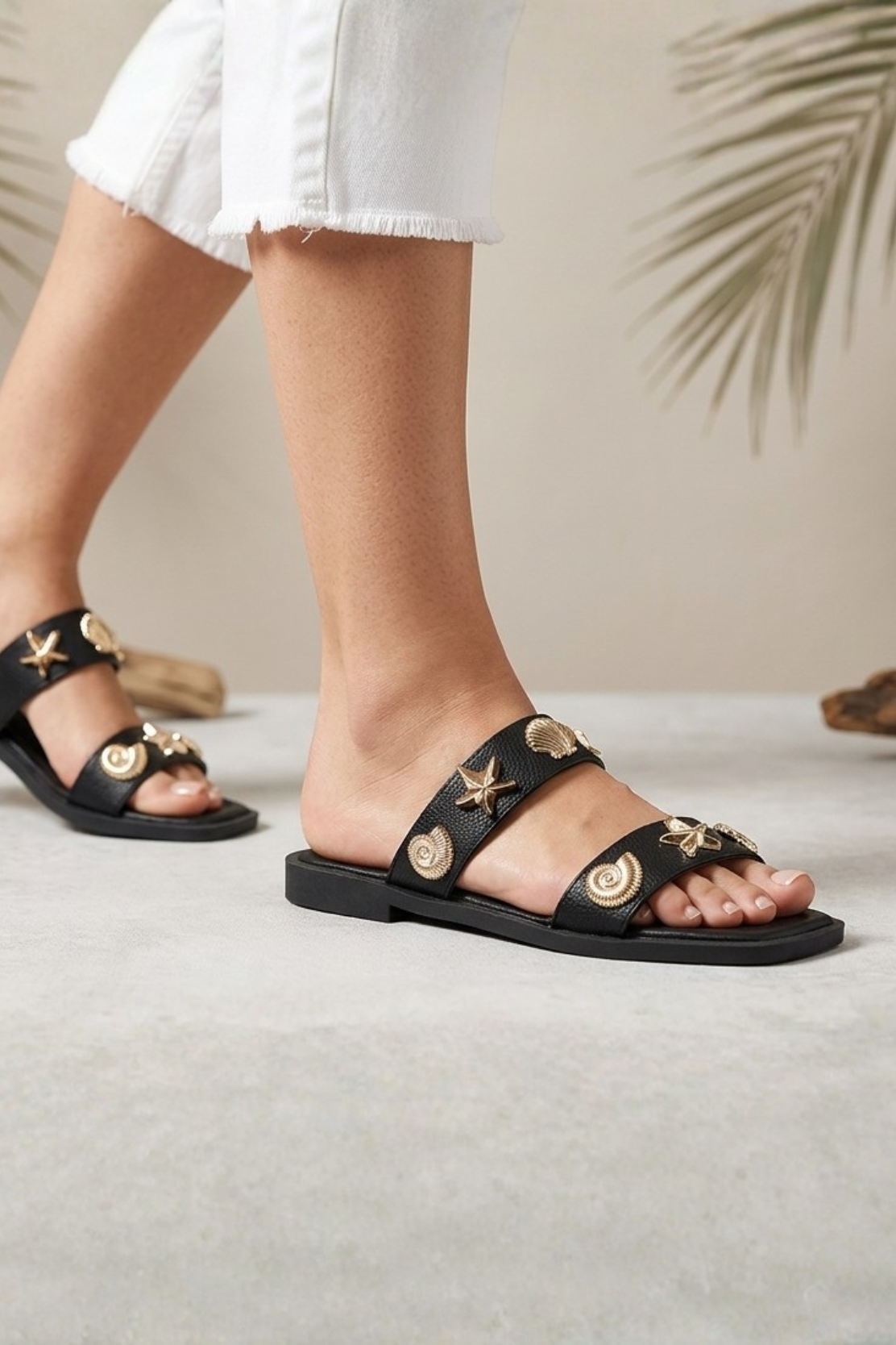 RARA Boutique nautical seashell charm double strap slide sandals, stylish beach-ready footwear with seashell accents.