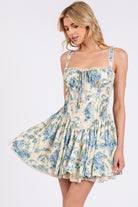 Floral corset drop-waist A-line mini dress by RARA Boutique, featuring a fitted bodice and flowy skirt.