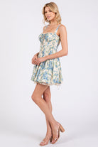 Floral drop-waist A-line mini dress by RARA Boutique featuring a fitted corset top and flowy skirt, perfect for spring events.