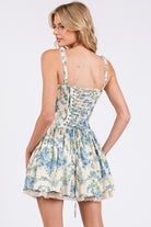 Floral corset drop-waist A-line mini dress by RARA Boutique, featuring a fitted bodice and flowy skirt with vibrant flower print.