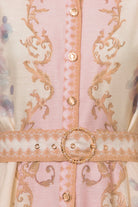 RARA Boutique Baroque scrollwork floral mini dress with pearl belt in baby pink, featuring intricate design and elegant details.