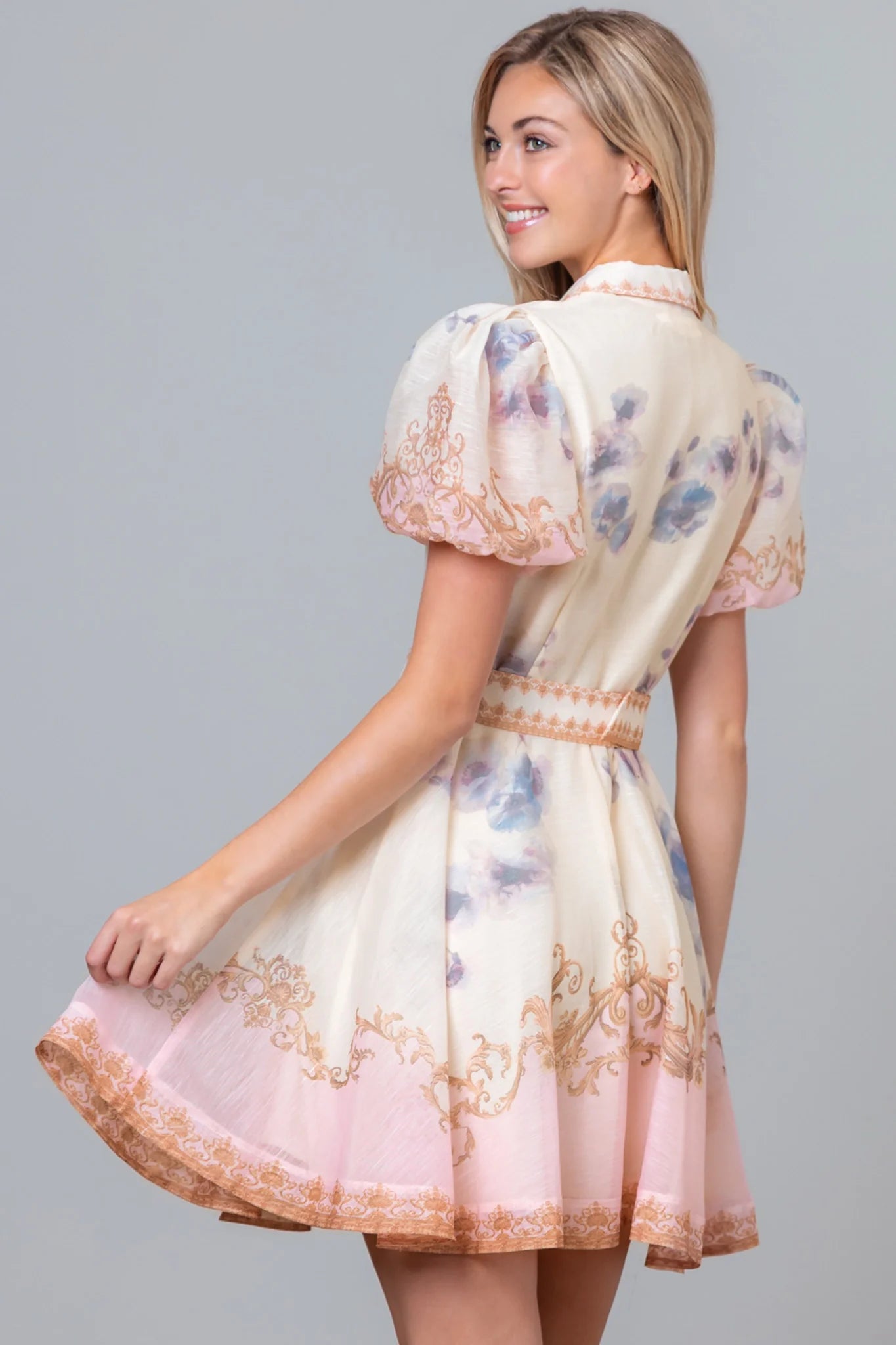 Pink Baroque scrollwork floral mini dress with pearl belt by RARA Boutique, featuring intricate patterns and elegant design.