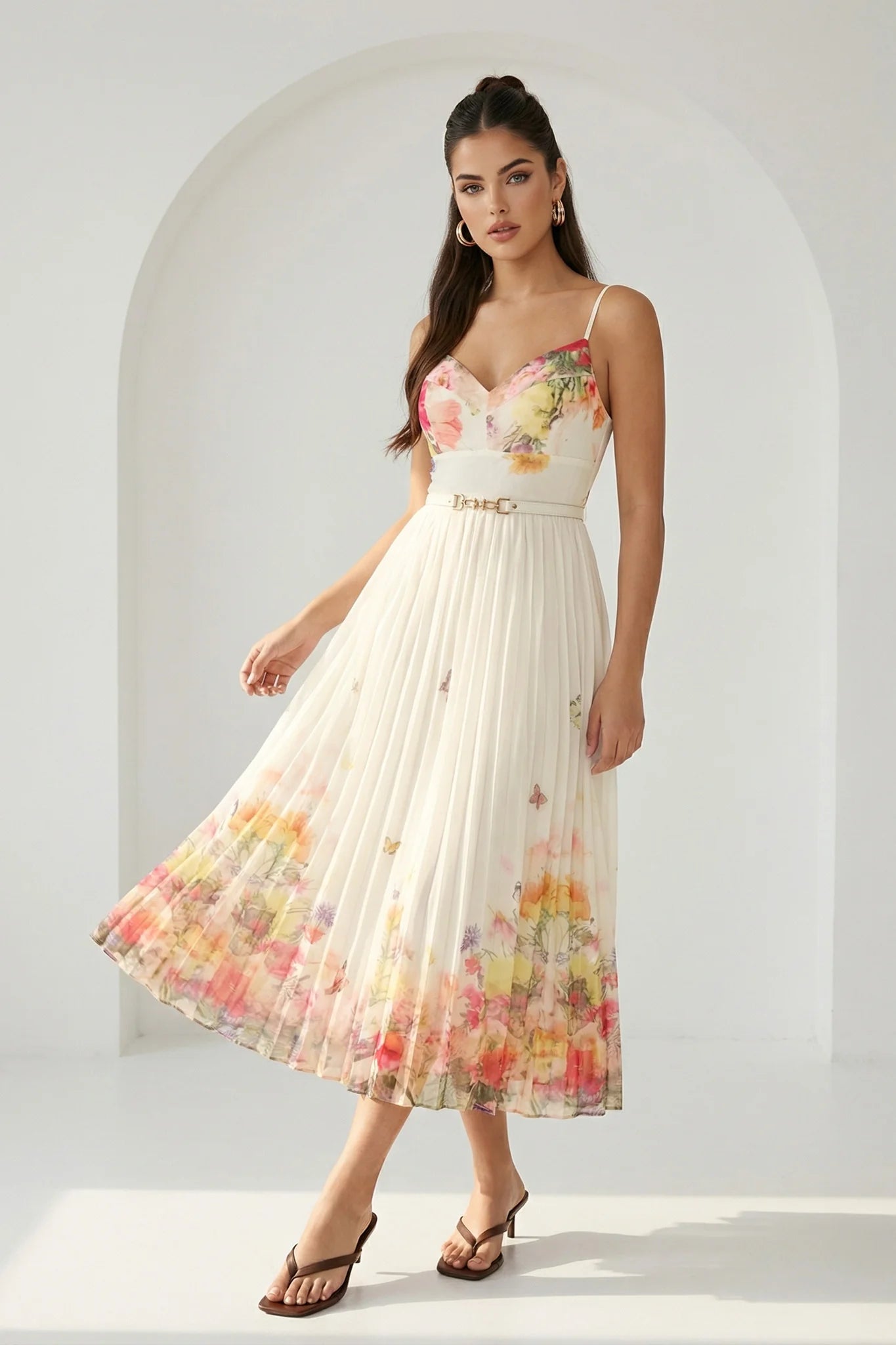 Watercolor floral butterfly pleated midi dress with belt by RARA Boutique, featuring soft peach tones and elegant design.