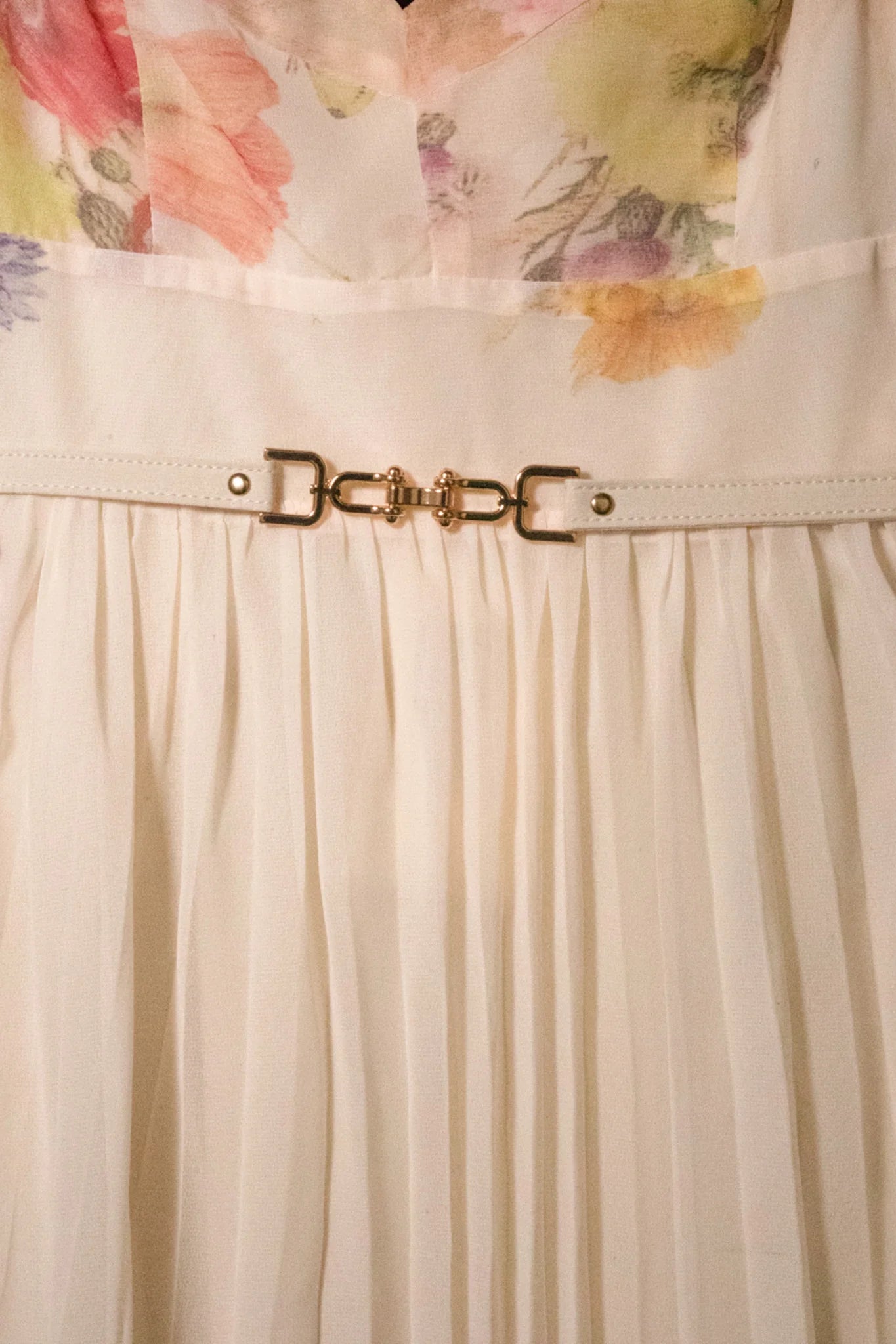 Watercolor floral butterfly print pleated midi dress with belt from RARA Boutique, in soft peach tones.