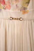 Watercolor floral butterfly print pleated midi dress with belt from RARA Boutique, in soft peach tones.