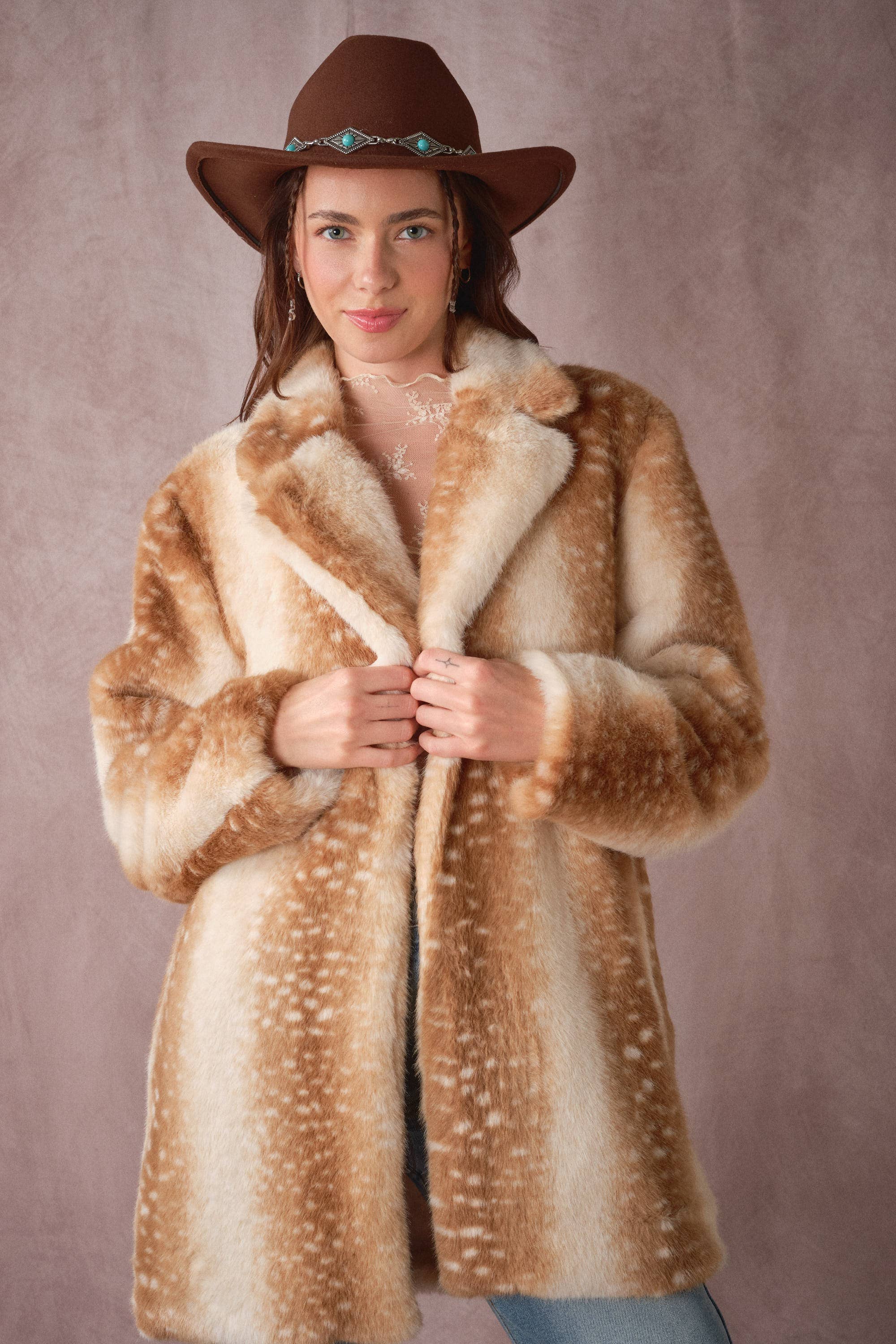 Blue B deer print faux fur coat with a plush, textured surface and stylish deer pattern design.