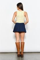 Embroidery hibiscus flower ribbed tank top from RARA Boutique featuring colorful floral embroidery on a fitted ribbed fabric.
