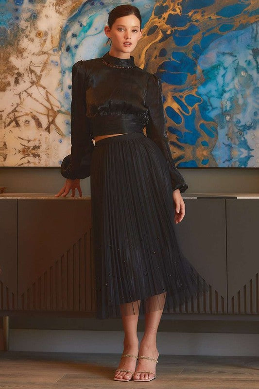 Pearl-embellished pleated mesh midi skirt by RARA Boutique, showcasing a flowy design with elegant pearl details.