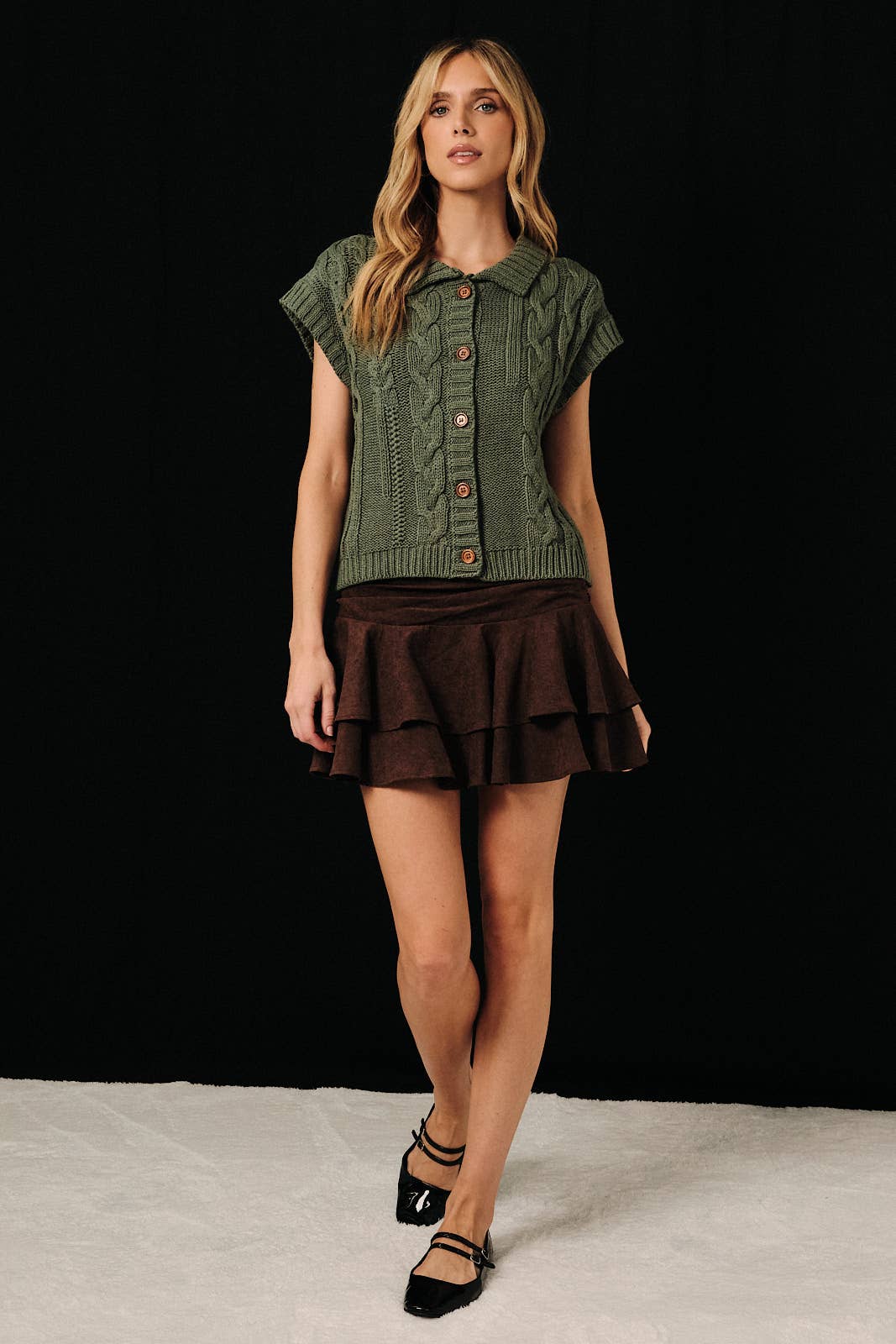 Cable knit button-up sweater vest by Sunday Edition, featuring a classic cable pattern and ribbed neckline in cozy knit fabric.