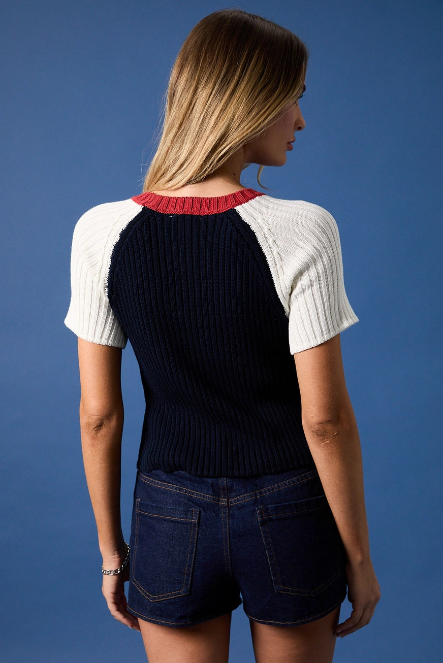 American flag raglan knit blouse by RARA Boutique featuring short sleeves and a casual, stylish design.